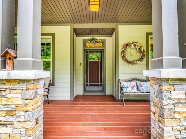 26 Balsam High Rd, Biltmore Lake, NC 28715 - view of exterior entry featuring a porch and stone siding