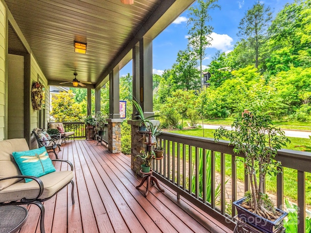 26 Balsam High Rd, Biltmore Lake, NC 28715 - wooden porch with view of wooded area and ceiling fan