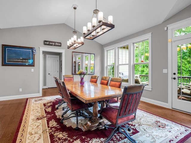 26 Balsam High Rd, Biltmore Lake, NC 28715 - dining room with lofted ceiling, wood finished floors, and a chandelier