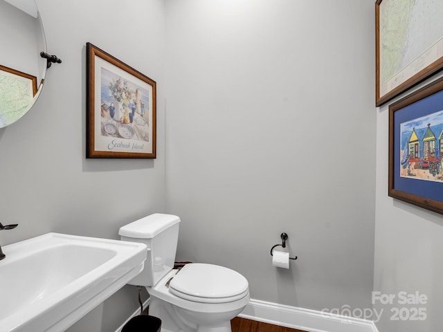 26 Balsam High Rd, Biltmore Lake, NC 28715 - half bathroom with toilet and wood finished floors
