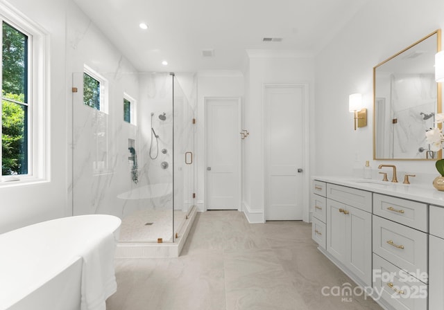 20000 Schooner Dr, Cornelius, NC 28031 - full bathroom featuring a marble finish shower, a freestanding bath, vanity, and recessed lighting