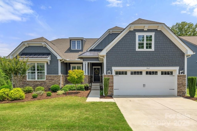 1467 Tranquility Blvd, Lancaster, SC 29720 - craftsman-style house featuring stone siding, concrete driveway, a front lawn, and a standing seam roof