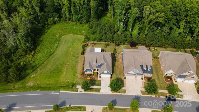 1467 Tranquility Blvd, Lancaster, SC 29720 - aerial perspective of suburban area featuring a forest