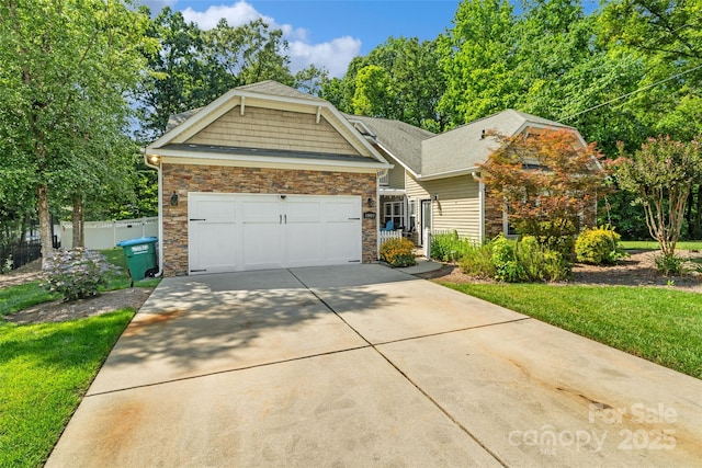 1009 Jerry Ln, Matthews, NC 28105 - craftsman-style house featuring stone siding, concrete driveway, and a garage