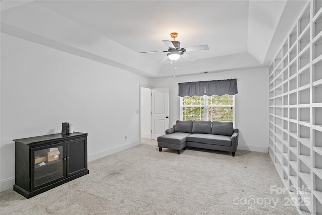 1009 Jerry Ln, Matthews, NC 28105 - carpeted living area with a raised ceiling, ceiling fan, and baseboards