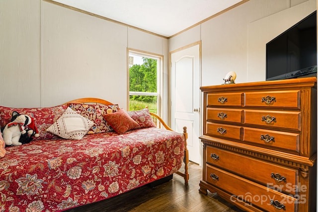 410 Fork Mountain Rd, Bakersville, NC 28705 - bedroom featuring ornamental molding and dark wood-type flooring
