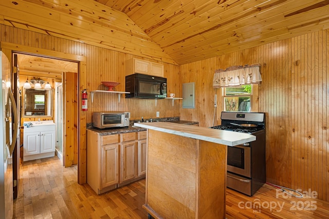 410 Fork Mountain Rd, Bakersville, NC 28705 - kitchen featuring stainless steel range with gas stovetop, black microwave, wood ceiling, lofted ceiling, and electric panel