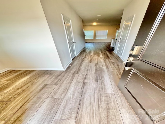 1510 Old Rivers Rd Unit 171, Concord, NC 28027 - hall featuring wood finished floors and baseboards