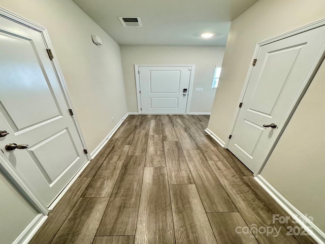 1510 Old Rivers Rd Unit 171, Concord, NC 28027 - corridor featuring wood finished floors and baseboards