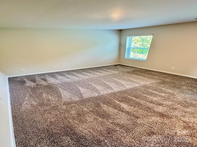 1510 Old Rivers Rd Unit 171, Concord, NC 28027 - spare room with baseboards and carpet
