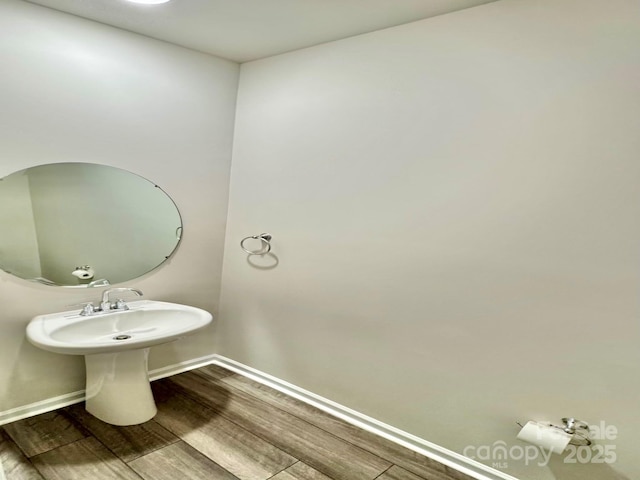 1510 Old Rivers Rd Unit 171, Concord, NC 28027 - bathroom featuring baseboards and wood finished floors