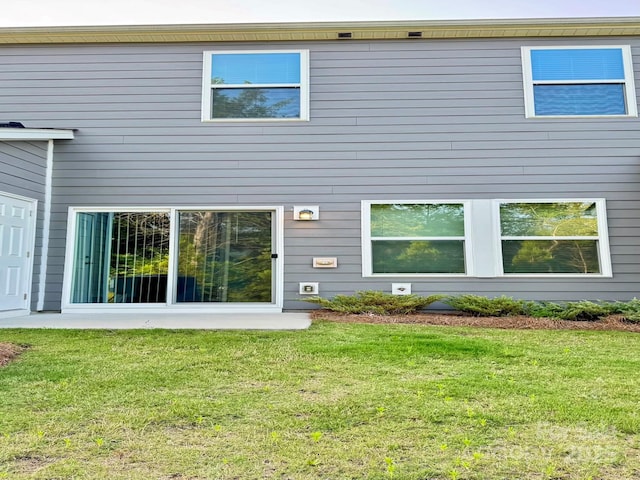 1510 Old Rivers Rd Unit 171, Concord, NC 28027 - rear view of house featuring a yard