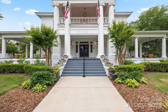 530 E Rutledge Ave, Gaffney, SC 29340 - view of exterior entry with french doors, a porch, and a balcony