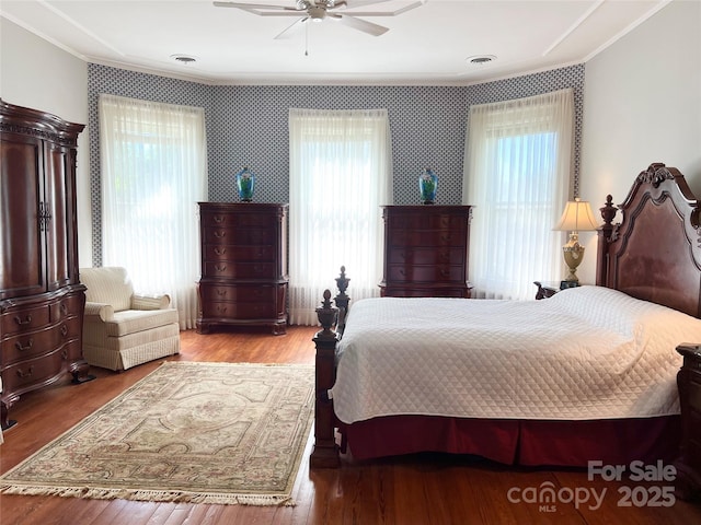530 E Rutledge Ave, Gaffney, SC 29340 - bedroom featuring crown molding, wood finished floors, a ceiling fan, and wallpapered walls