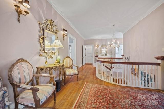 530 E Rutledge Ave, Gaffney, SC 29340 - sitting room featuring a chandelier, an upstairs landing, wood finished floors, and ornamental molding