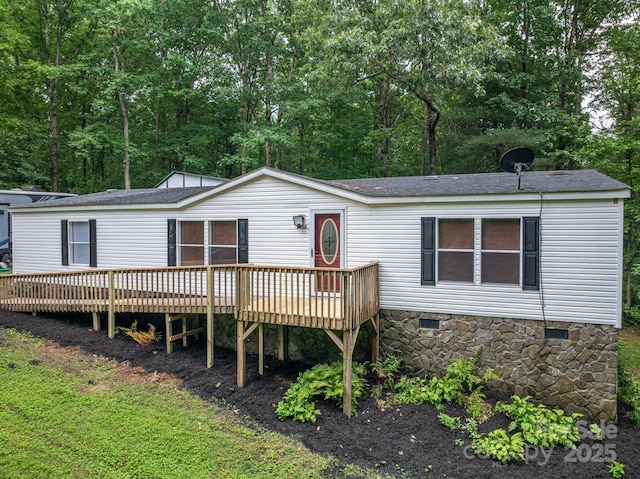 6903 Knottywood Ln Unit 21, Vale, NC 28168 - manufactured / mobile home with a wooden deck, crawl space, and roof with shingles