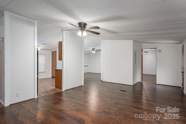 6903 Knottywood Ln Unit 21, Vale, NC 28168 - unfurnished living room featuring a ceiling fan, wood finished floors, and a textured ceiling