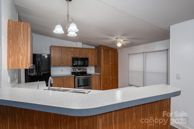 6903 Knottywood Ln Unit 21, Vale, NC 28168 - kitchen featuring black appliances, brown cabinets, a sink, a ceiling fan, and vaulted ceiling