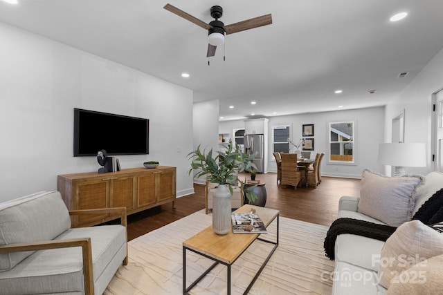 1922 Thomas Ave, Charlotte, NC 28205 - living room featuring a ceiling fan, recessed lighting, and wood finished floors
