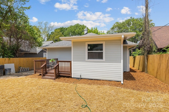 1922 Thomas Ave, Charlotte, NC 28205 - rear view of property with a fenced backyard, a deck, and roof with shingles
