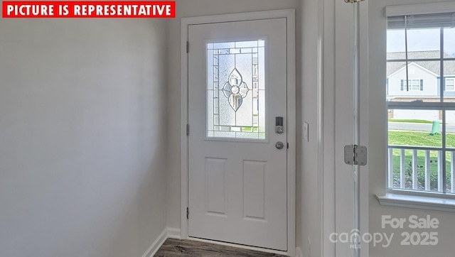 8036 Kennesaw Dr, Gastonia, NC 28056 - doorway to outside with baseboards and wood finished floors
