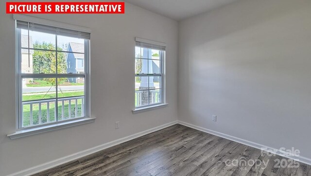 8036 Kennesaw Dr, Gastonia, NC 28056 - spare room with wood finished floors and baseboards