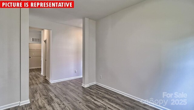 8036 Kennesaw Dr, Gastonia, NC 28056 - unfurnished room featuring dark wood-style flooring and baseboards