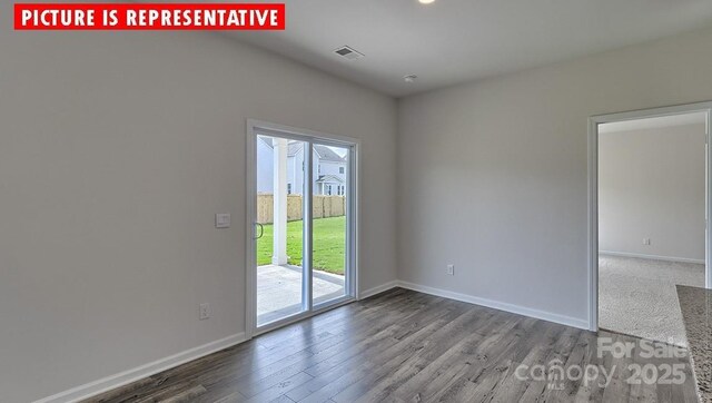 8036 Kennesaw Dr, Gastonia, NC 28056 - unfurnished room with healthy amount of natural light, wood finished floors, and baseboards