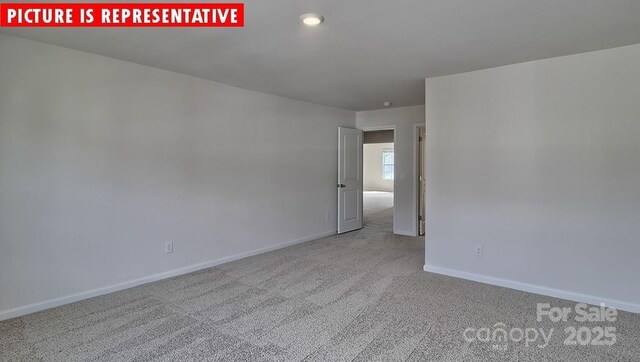 8036 Kennesaw Dr, Gastonia, NC 28056 - empty room with carpet floors and baseboards