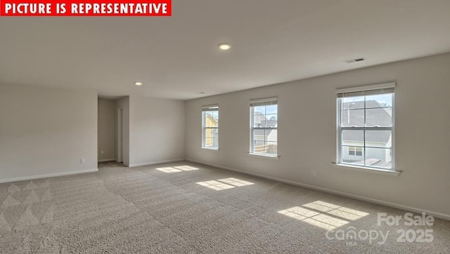 8036 Kennesaw Dr, Gastonia, NC 28056 - empty room featuring carpet floors, baseboards, and recessed lighting