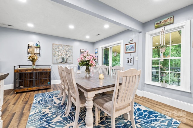 4236 Carrington Ct SW, Concord, NC 28027 - dining area with recessed lighting, baseboards, wood finished floors, and plenty of natural light