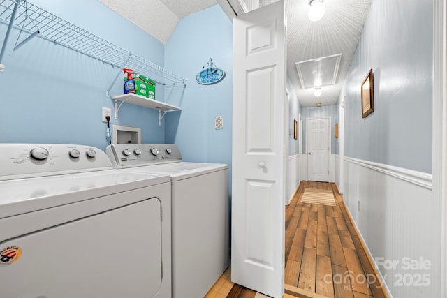 4236 Carrington Ct SW, Concord, NC 28027 - laundry area featuring attic access and washing machine and clothes dryer
