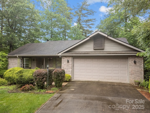 206 Pine Knot Trl, Hendersonville, NC 28739 - ranch-style house with brick siding, asphalt driveway, a garage, and roof with shingles
