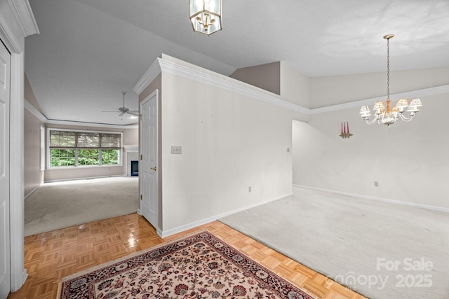 206 Pine Knot Trl, Hendersonville, NC 28739 - foyer with a chandelier, a fireplace, baseboards, and ceiling fan