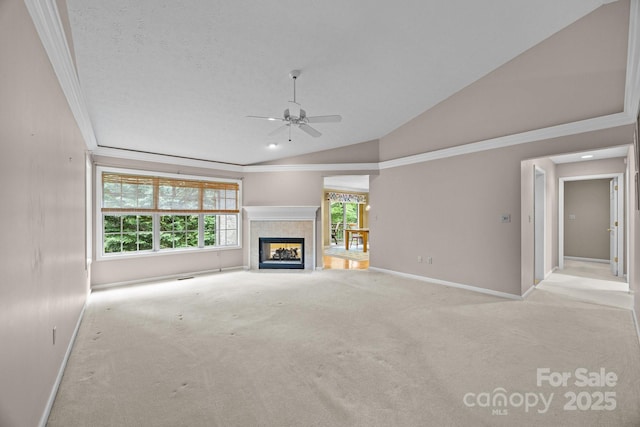 206 Pine Knot Trl, Hendersonville, NC 28739 - unfurnished living room featuring baseboards, lofted ceiling, ceiling fan, carpet floors, and crown molding
