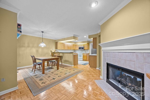 206 Pine Knot Trl, Hendersonville, NC 28739 - dining space with baseboards, a tile fireplace, crown molding, and recessed lighting
