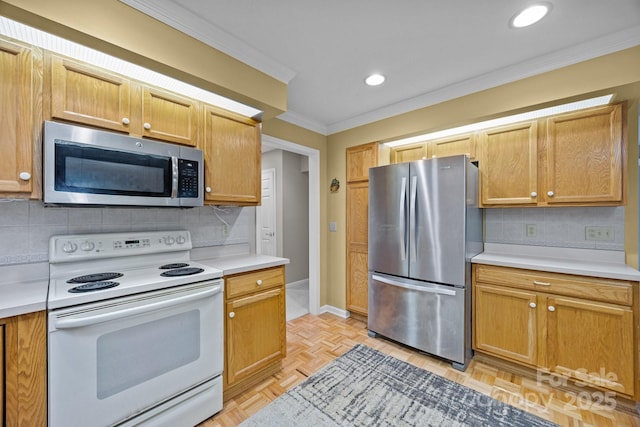 206 Pine Knot Trl, Hendersonville, NC 28739 - kitchen with stainless steel appliances, light countertops, crown molding, backsplash, and recessed lighting