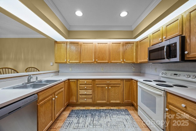 206 Pine Knot Trl, Hendersonville, NC 28739 - kitchen with stainless steel appliances, a sink, crown molding, light countertops, and decorative backsplash