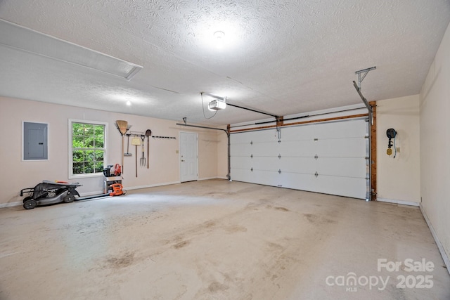 206 Pine Knot Trl, Hendersonville, NC 28739 - garage featuring a garage door opener, electric panel, and baseboards