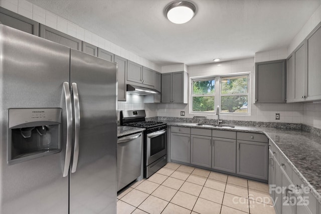 1810 13th Ave NE, Hickory, NC 28601 - kitchen with stainless steel appliances, gray cabinetry, and dark stone countertops