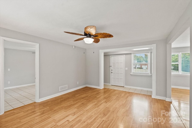 1810 13th Ave NE, Hickory, NC 28601 - unfurnished room with a ceiling fan and light wood-style floors