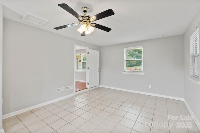 1810 13th Ave NE, Hickory, NC 28601 - unfurnished room featuring attic access, ceiling fan, and light tile patterned floors