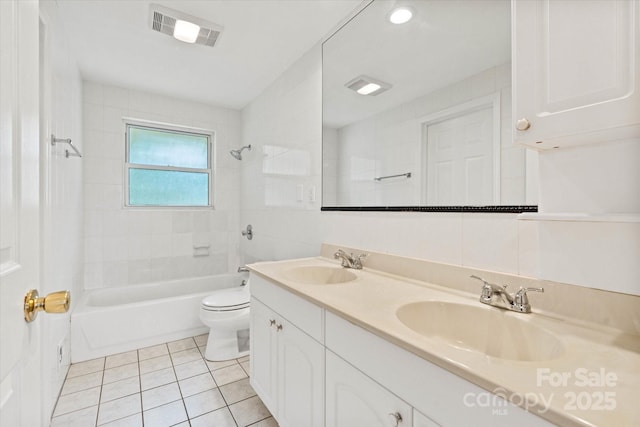 1810 13th Ave NE, Hickory, NC 28601 - bathroom featuring shower / washtub combination, double vanity, and tile patterned floors
