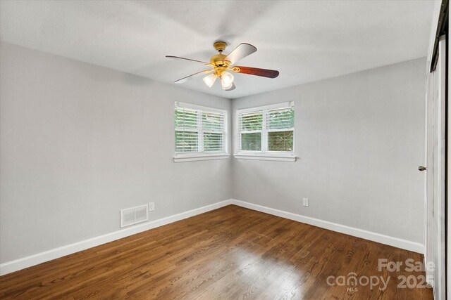 1810 13th Ave NE, Hickory, NC 28601 - spare room with ceiling fan and wood finished floors