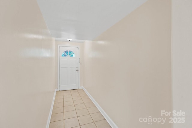 1810 13th Ave NE, Hickory, NC 28601 - doorway to outside featuring light tile patterned flooring and baseboards