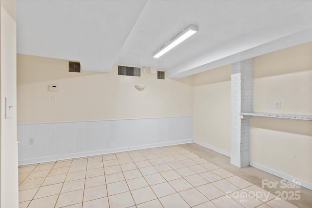 1810 13th Ave NE, Hickory, NC 28601 - spare room with baseboards and wainscoting