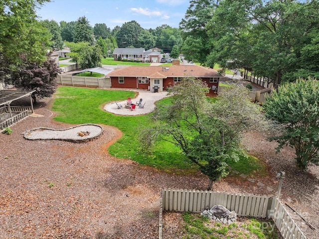 1810 13th Ave NE, Hickory, NC 28601 - fenced backyard featuring a patio area and view of wooded area