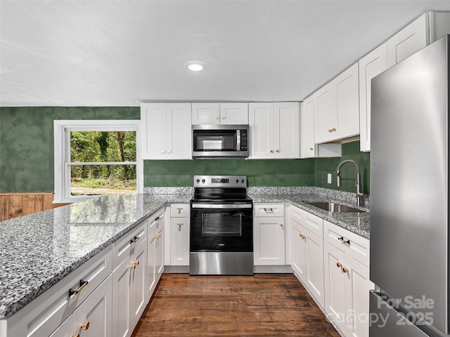 15 Burtiller Ln, Fletcher, NC 28732 - kitchen featuring stainless steel appliances, a sink, white cabinetry, and recessed lighting