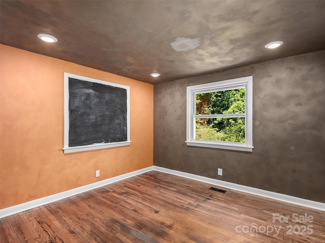 15 Burtiller Ln, Fletcher, NC 28732 - spare room with wood finished floors, baseboards, and recessed lighting