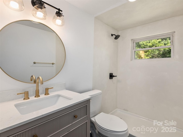 15 Burtiller Ln, Fletcher, NC 28732 - bathroom featuring toilet, vanity, and a shower